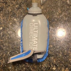 Ultimate Direction Gray and Blue running Water Bottle